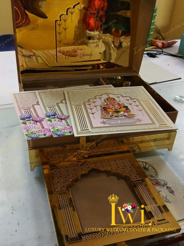 Lord Shri Ganeshji Wedding Invitation Golden Box Design By Luxury wedding invite & packaging invation showing