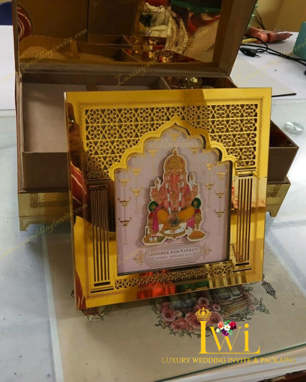 Lord Shri Ganeshji Wedding Invitation Golden Box Design By Luxury wedding invite & packaging acrlic frame of invitation