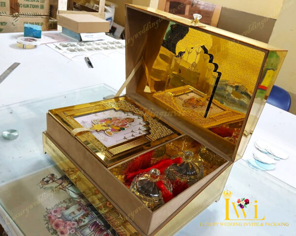Lord Shri Ganeshji Wedding Invitation Golden Box Design By Luxury wedding invite & packaging wide angle