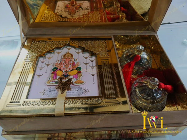 Lord Shri Ganeshji Wedding Invitation Golden Box Design By Luxury wedding invite & packaging front view