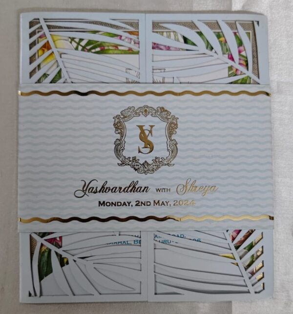 leaf design laser cut invitation cards by luxury wedding invite & packaging.